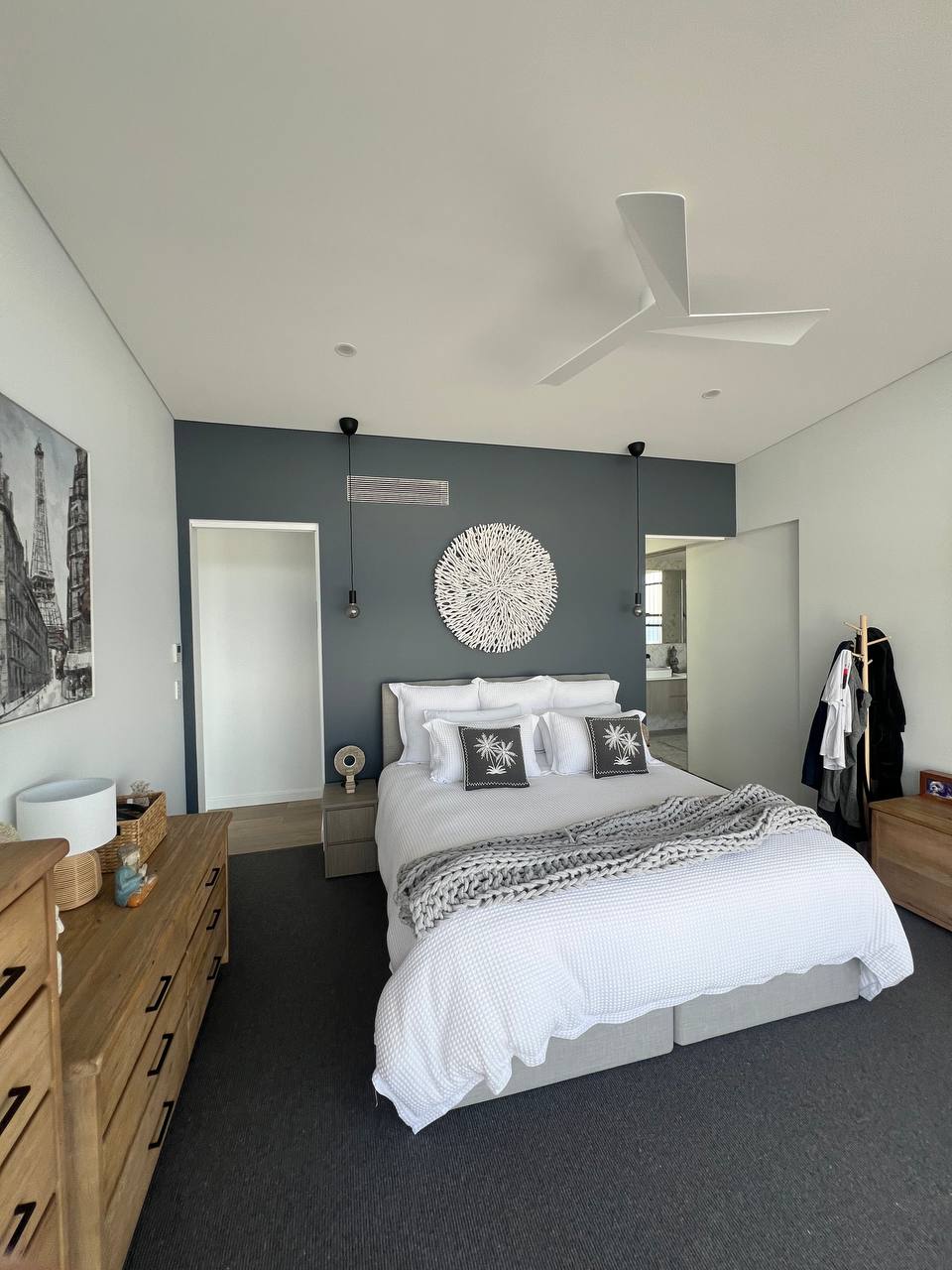 BRIMO finished bedroom with dark feature wall